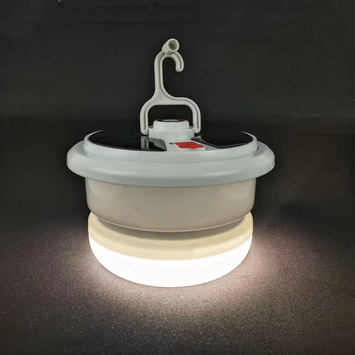 Sklopiva solarna LED lampa sa toplim belim svetlom i integrisanom kukom za kačenje