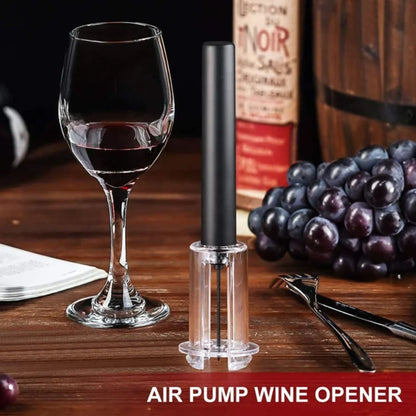 vazdusni otvarac za vino postavljen pored case vina