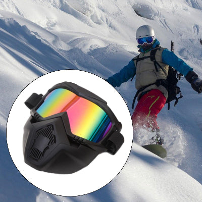 Zastitna maska sa naocarima sa reflektujucim staklom, u upotrebi tokom snouborda. Maska je pogodna za skijanje.