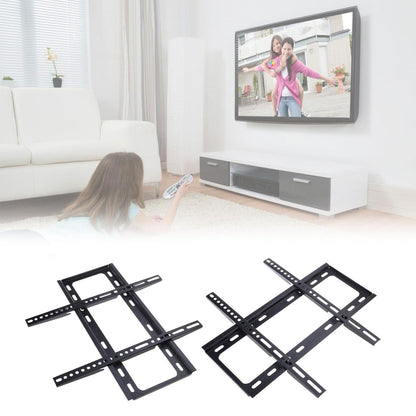 Zidni nosac za televizor montiran u dnevnoj sobi na beli zid